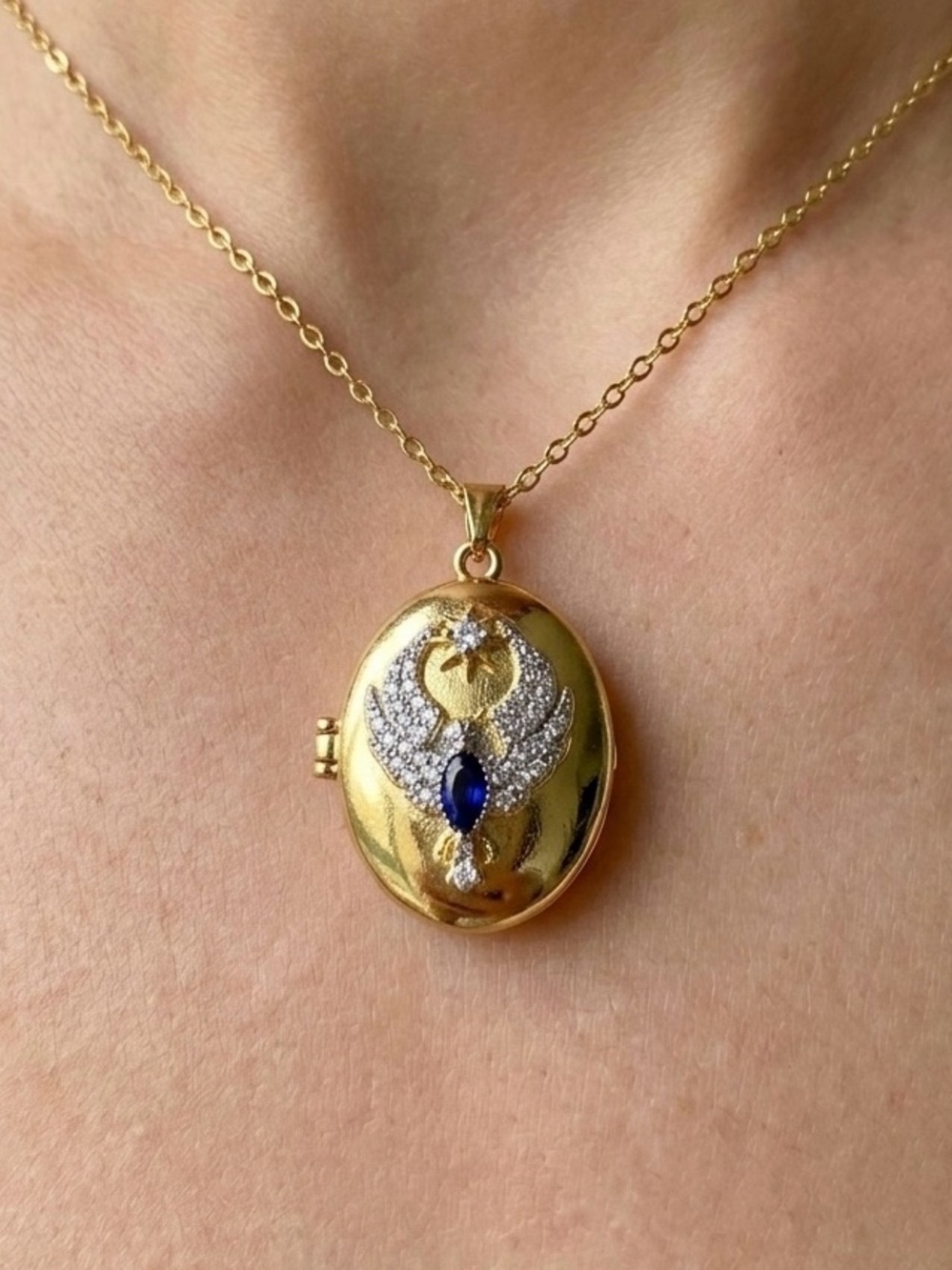 Elegant Gold and Blue Locket Necklace